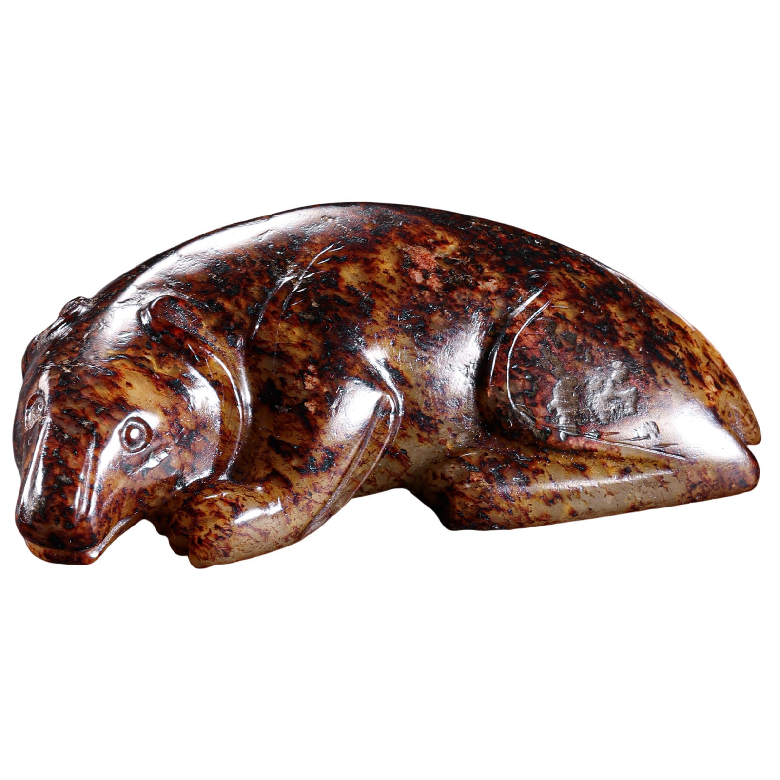 Han Dynasty Hetian Jade Recumbent Beast: 2nd Century BCE–2nd Century CE; L. 7 cm, H. 3 cm; Weight 73 g; L. approx. 2.76 in, H. approx. 1.18 inCondition and Provenance: Good condition, with the overall form intact, warm jade texture, natura