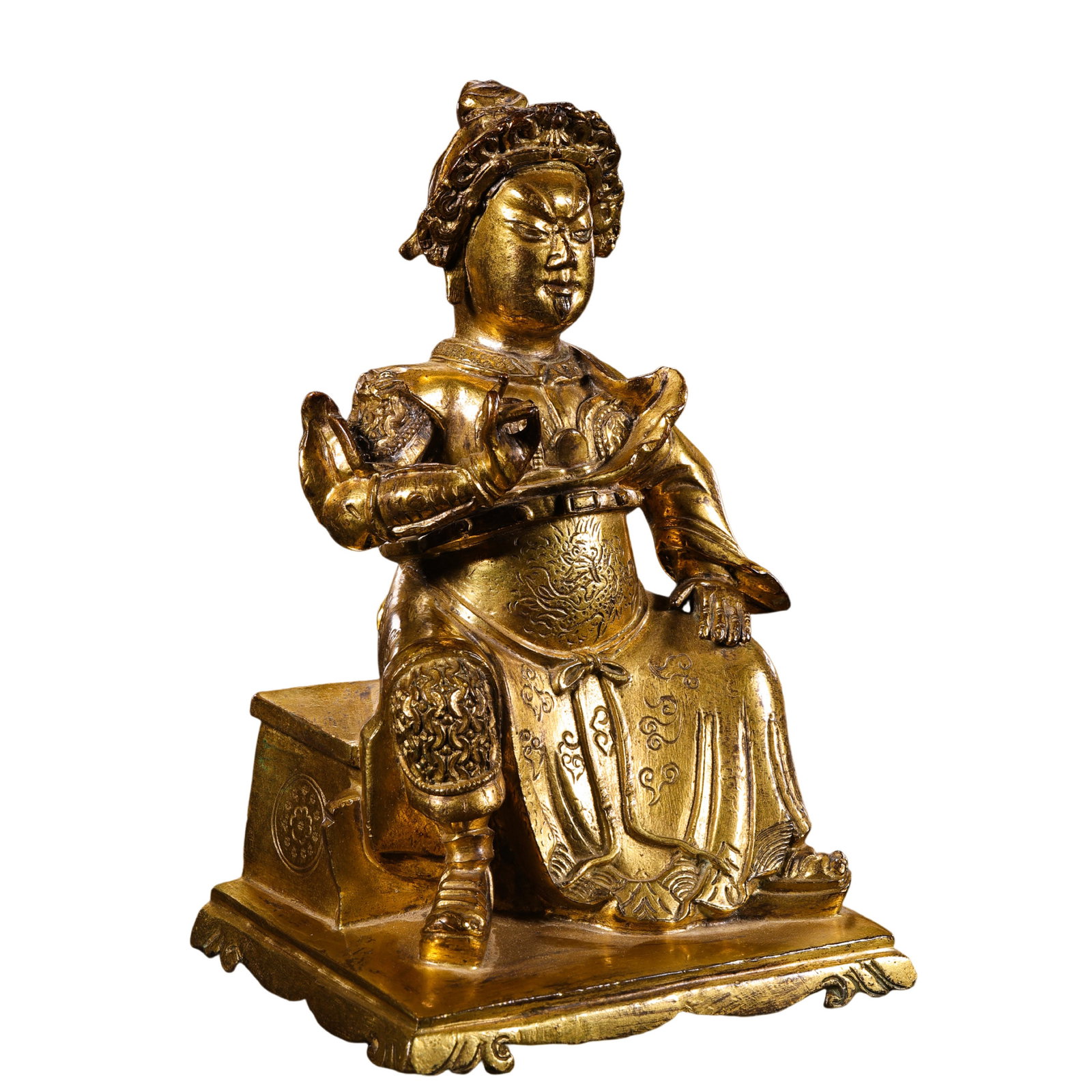 18th-Century Tibetan Gilt-Bronze Seated Guardian Figure: 18th Century; H. 17.5 cm, W. 11 cm; Weight 2018 g; H. approx. 6.89 in, W. approx. 4.33 inCondition and Provenance: Good condition, with the overall structure intact, natural wear to the gilding, surfa