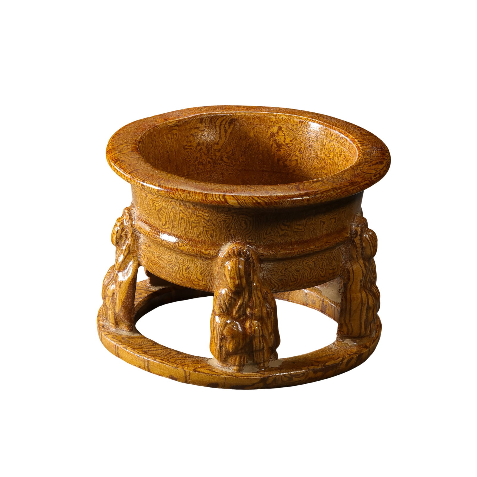Tang Dynasty Sancai Amber-Glazed Tripod Censer with Marbled Effect: 7th–10th Century; H. 6.4 cm, Diam. 9.5 cm; H. approx. 2.52 in, Diam. approx. 3.74 inCondition and Provenance: Good condition, with the overall form intact, lustrous glaze, natural crackling, firing 