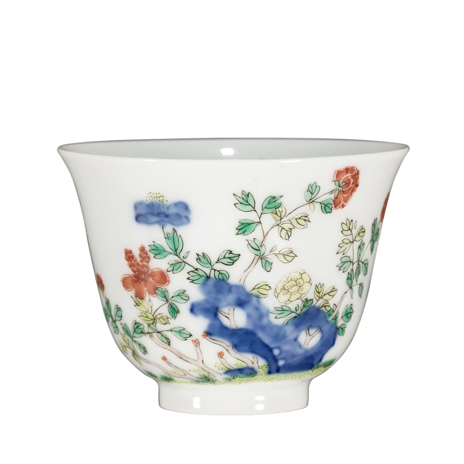 Kangxi Period, Qing Dynasty Doucai Cup with Flower and Rock Design: 17th–18th Century; H. 5 cm, Diam. 7 cm; H. approx. 1.97 in, Diam. approx. 2.76 inCondition and Provenance: Good condition, with the overall form intact, lustrous glaze, elegant doucai enamels, minor