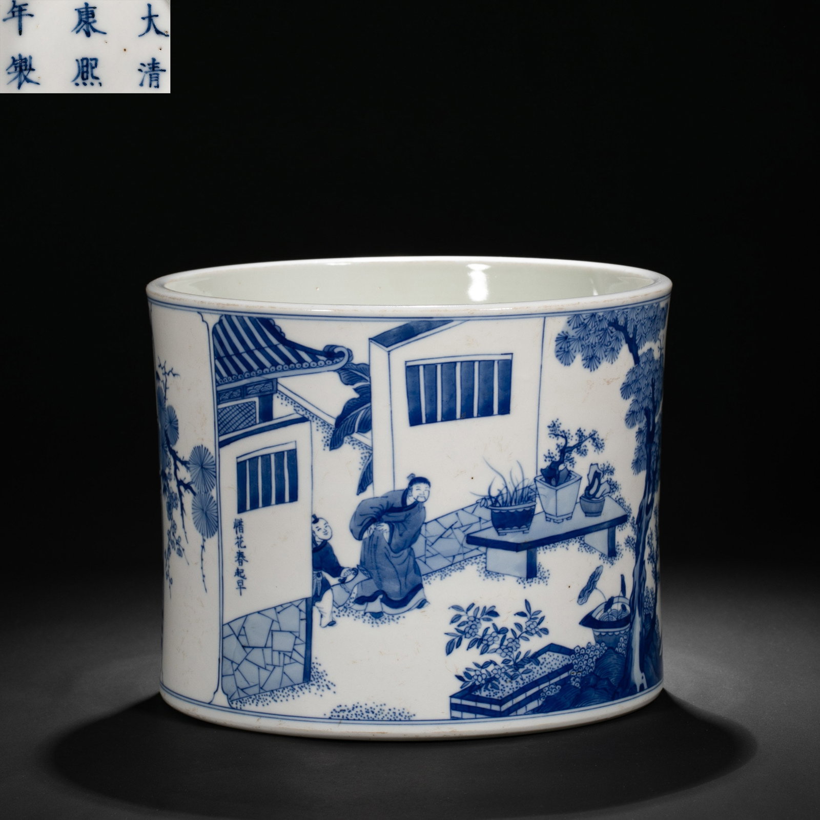 Kangxi Period, Qing Dynasty Blue-and-White Brush Pot with Courtyard Figure Scene: 17th–18th Century; H. 15 cm, Diam. 9.5 cm; H. approx. 5.91 in, Diam. approx. 3.74 inCondition and Provenance: Good condition, with the overall form intact, lustrous glaze, elegant cobalt-blue decora
