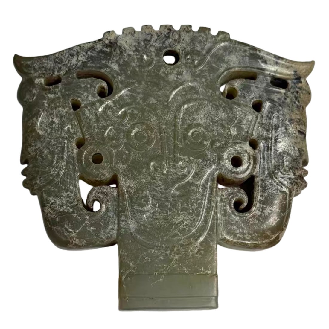A Hetian Jade Divine Figure and Animal-Mask Pendant, Shijiahe Culture, Neolithic Period: approx. 6.2 cm (2.4 in), Width: approx. 5.8 cm (2.3 in), circa 2500–2000 BCE, 3rd Millennium BCECondition & Provenance:?In good condition overall, with natural alteration, calcification, burial stai