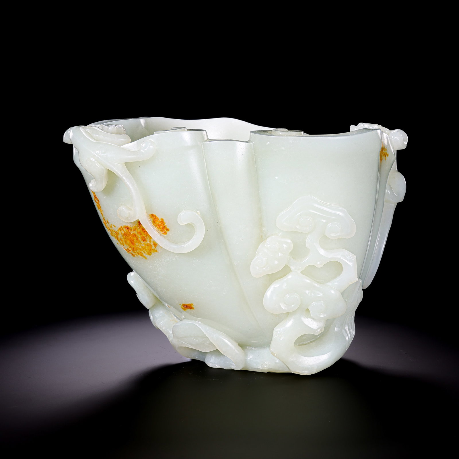 A Hetian Jade Lotus-Petal Brush Washer with Cloud Motifs, Qing Dynasty (1 of 11)