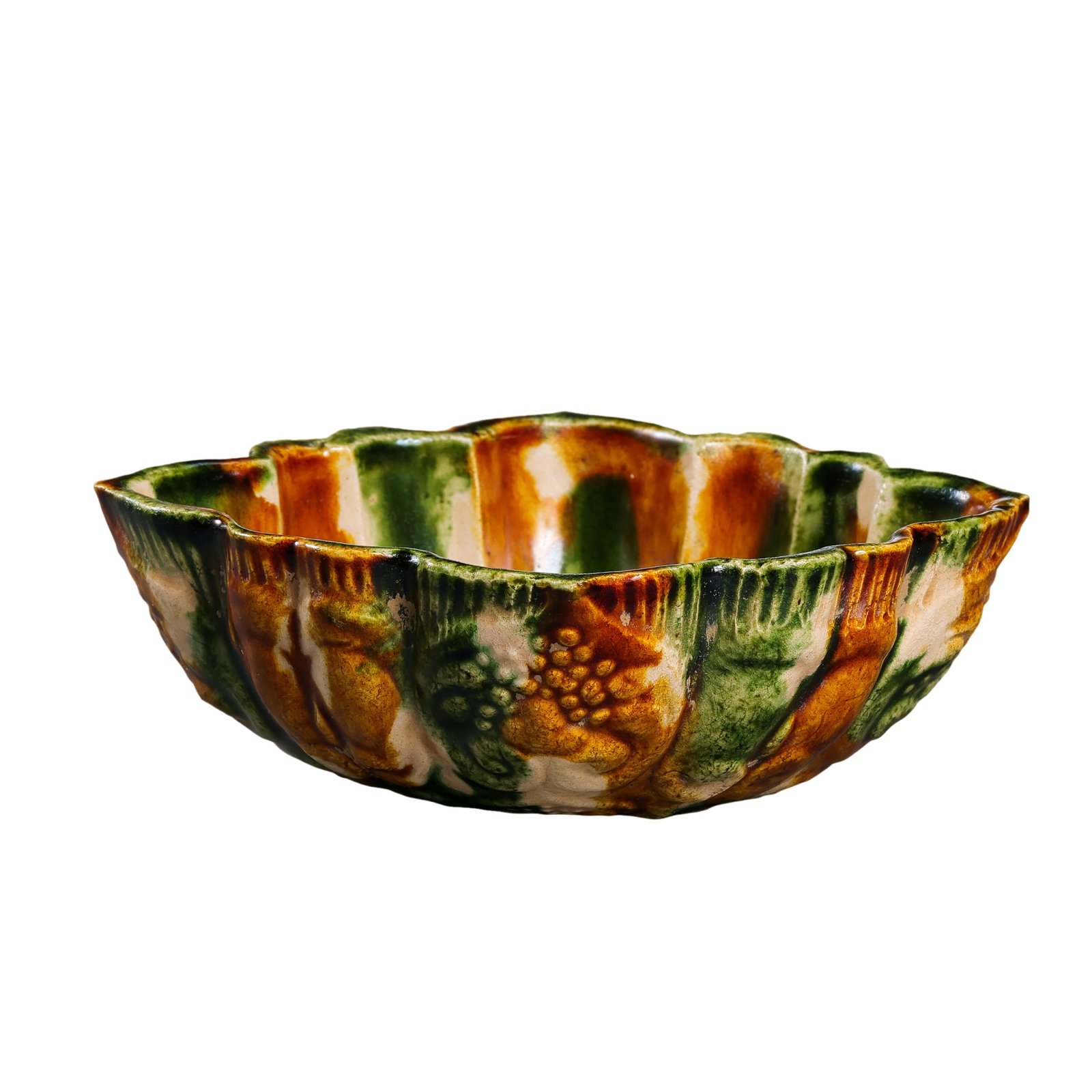 A Tang-Dynasty Sancai Lotus-Petal Bowl: approx. 11 cm (4.3 in), Height: approx. 3.7 cm (1.5 in), 7th–10th CenturyCondition & Provenance:?In good condition overall, with the form well preserved. The sancai glaze shows natural flowing color