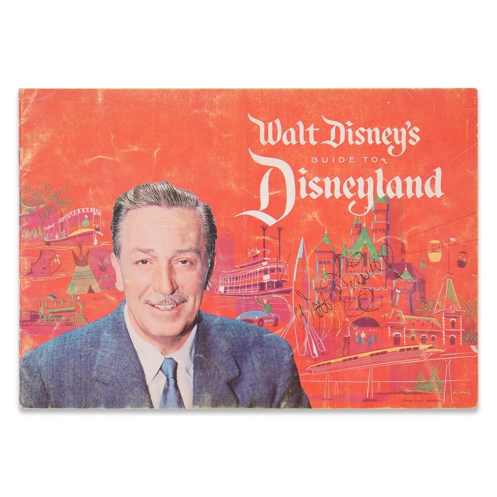 WALT DISNEY SIGNED "WALT DISNEY'S GUIDE TO DISNEYLAND" SOUVENIR BROCHURE: 11 1/2 x 8 1/8 in (29.3 x 20.5 cm) Provenance and Authentication: This collectible has undergone a rigorous forensic evaluation. The signatures were carefully analyzed across multiple criteria, includ