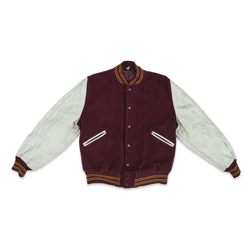 THE BEATLES FULLY SIGNED BUTWIN VARSITY LETTERMAN JACKET: Size 46; Length: 25 5/8 in (65 cm); Sleeve: 25 5/8 in (65 cm); Shoulder: 18 1/8 in (46 cm) Provenance and Authentication: According to the accompanying documentation provided by the consignor, the