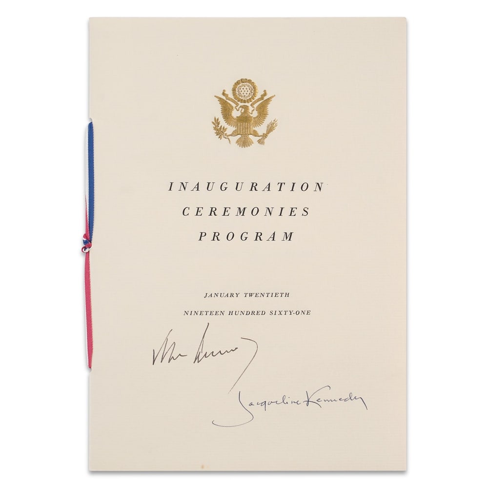 JOHN F. KENNEDY & JACQUELINE KENNEDY SIGNED 1961 PRESIDENTIAL INAUGURATION CEREMONIES PROGRAM: 9 1/8 x 6 1/4 in (23.1 x 16 cm) Provenance and Authentication: According to the Letter of Authenticity (LOA) and Certificate of Authenticity (COA) provided by the consignor, this collectible was
