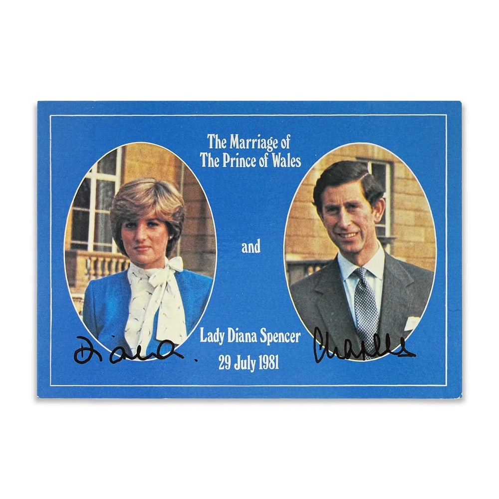 CHARLES & DIANA SIGNED 1981 ROYAL WEDDING COMMEMORATIVE POSTCARD: 5 7/8 x 4 1/8 in (15 x 10.5 cm) Provenance and Authentication: According to the accompanying documentation provided by the consignor, the signatures have been examined with reference to multiple