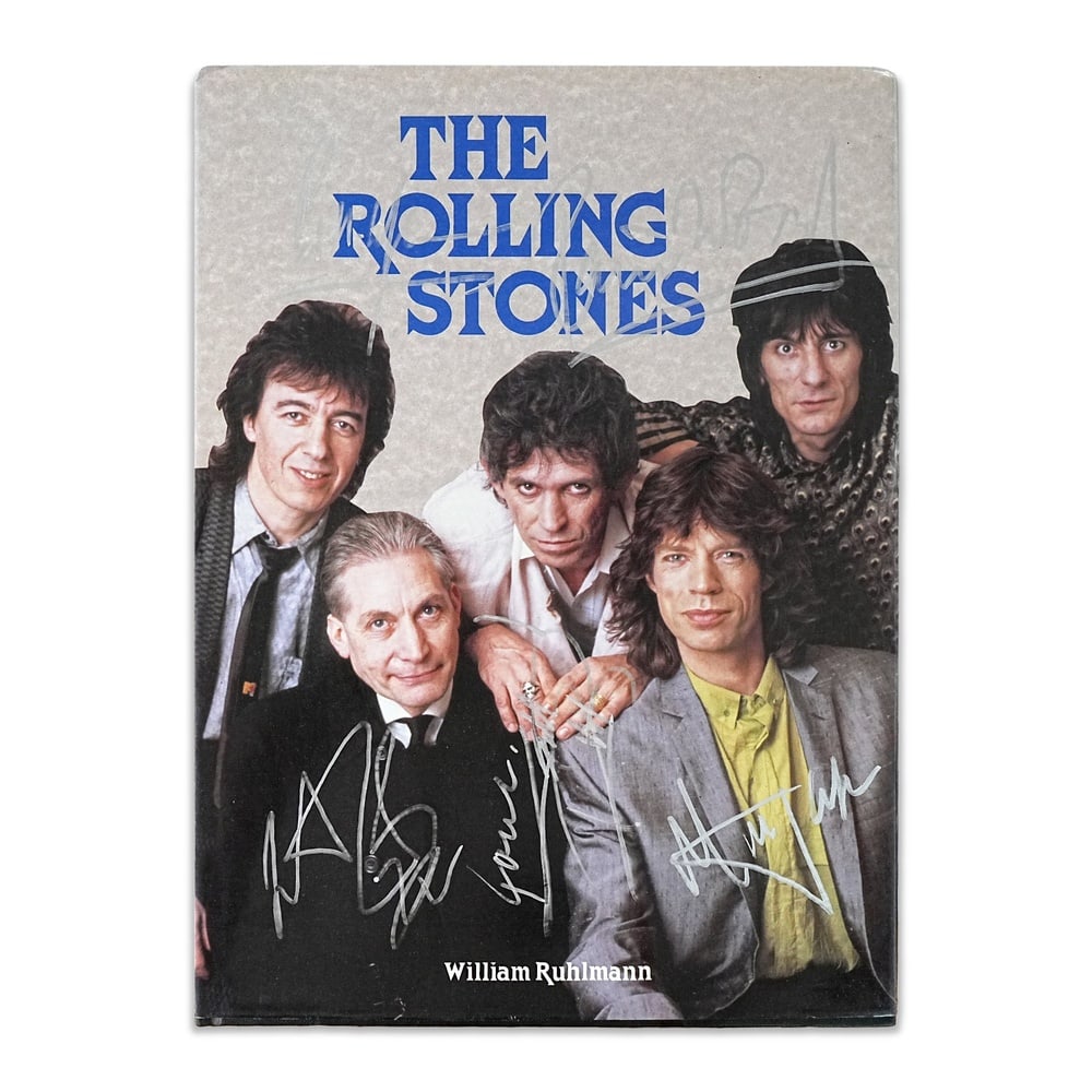 THE ROLLING STONES FULLY SIGNED "THE ROLLING STONES" BOOK, 1993 FIRST EDITION / FIRST PRINTING: 13 1/8 x 9 1/2 in (33.3 x 24 cm) Provenance and Authentication: According to the accompanying documentation provided by the consignor, the signatures have been examined with reference to multiple