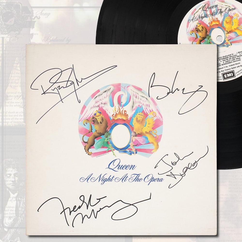 QUEEN FULLY SIGNED "A NIGHT AT THE OPERA" LP: 12 3/8 x 12 3/8 in (31.5 x 31.5 cm) Provenance and Authentication: According to the accompanying documentation provided by the consignor, the signatures have been examined with reference to multiple