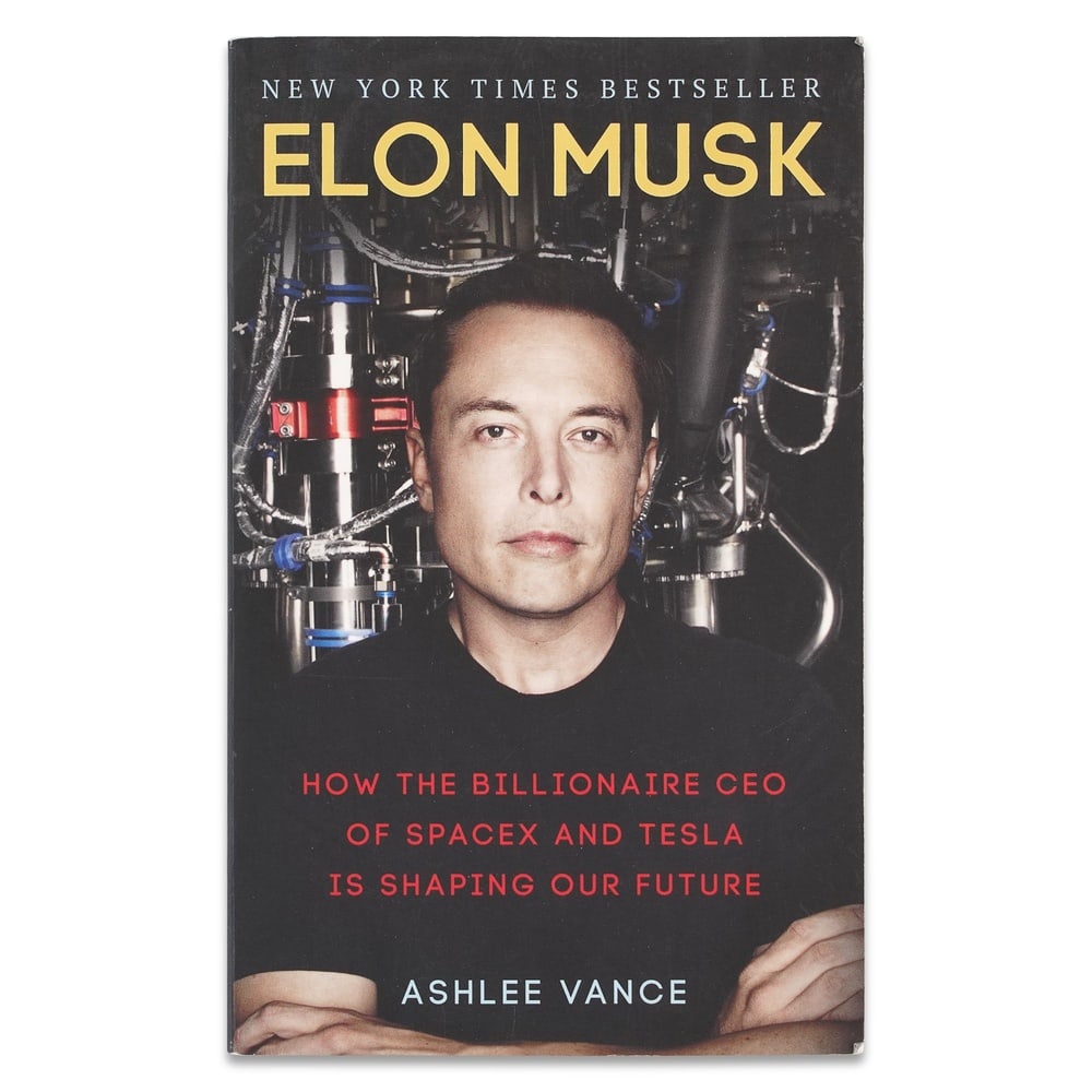 ELON MUSK SIGNED "ELON MUSK: HOW THE BILLIONAIRE CEO OF SPACEX AND TESLA IS SHAPING OUR FUTURE": 7 x 4 3/8 in (17.7 x 11 cm) Provenance and Authentication: According to the accompanying documentation provided by the consignor, the signatures have been examined with reference to multiple factors,