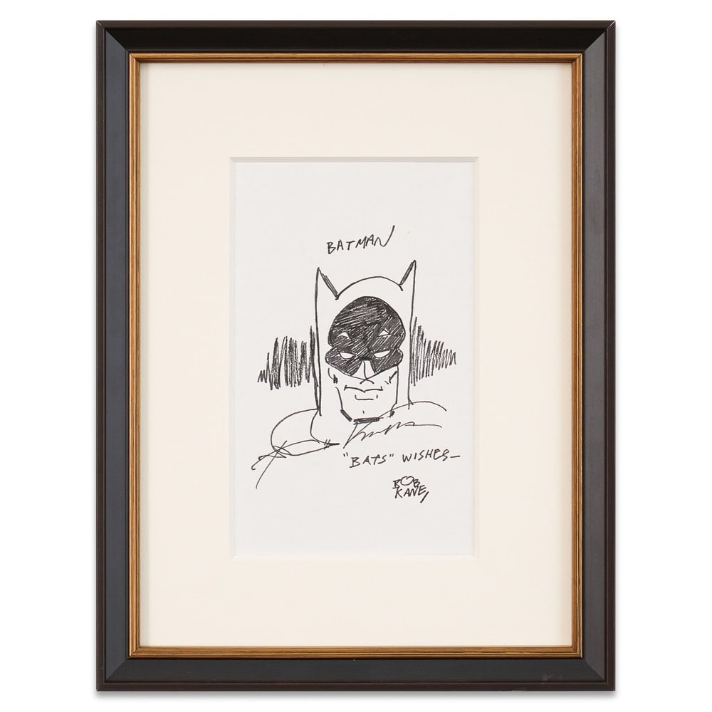 BOB KANE HAND-DRAWN AND SIGNED BATMAN ILLUSTRATION: Image Dimensions: 7 5/8 x 4 3/8 in (19.4 x 11.2 cm) Framed Dimensions: 13 1/8 x 10 in (33.3 x 25.5 cm) Provenance and Authentication: According to the Letter of Authenticity (LOA) and Certificate of