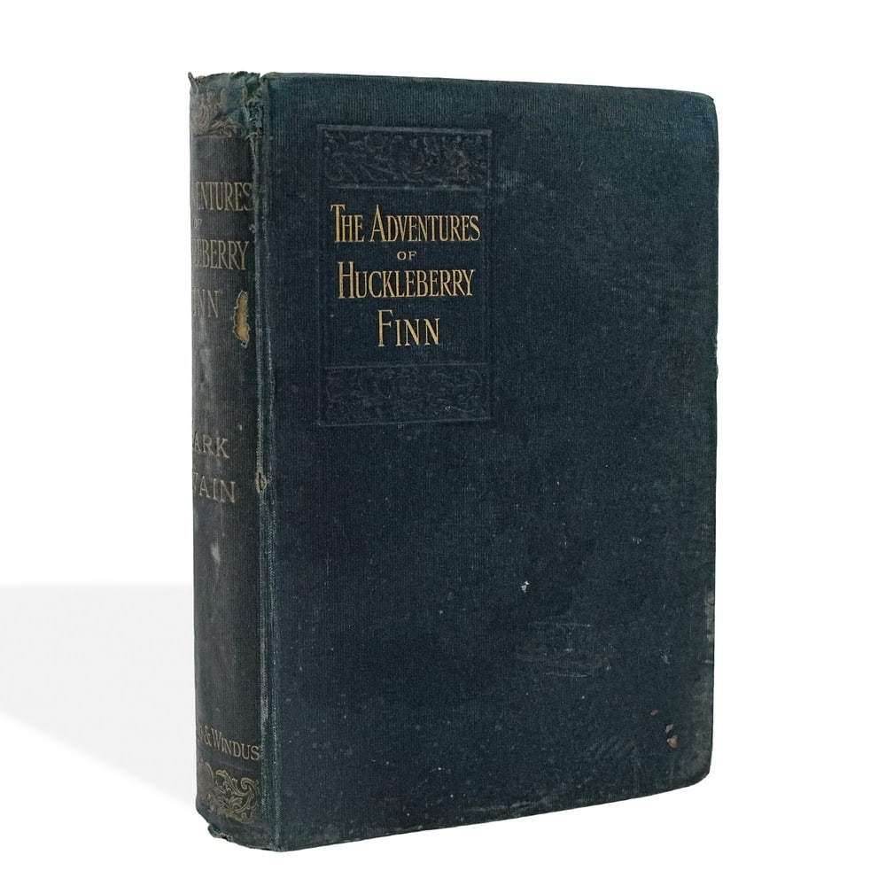 MARK TWAIN (1835-1910) SIGNED "THE ADVENTURES OF HUCKLEBERRY FINN" BOOK, 1898: 7 3/4 x 5 3/8 in (19.6 x 13.5 cm) Provenance and Authentication: According to the Letter of Authenticity (LOA) and Certificate of Authenticity (COA) provided by the consignor, this collectible was