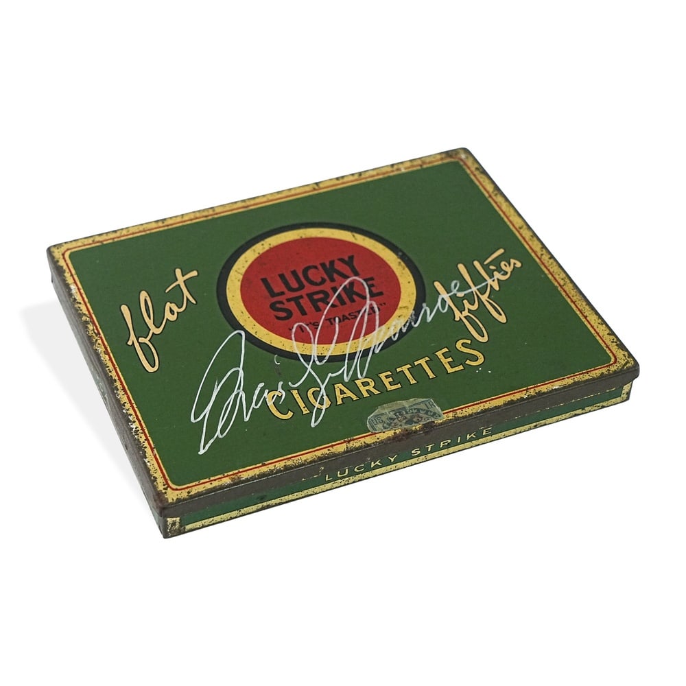 MARILYN MONROE SIGNED LUCKY STRIKE CIGARETTE TIN: 5 3/4 x 4 1/2 in (14.5 x 11.3 cm) Provenance and Authentication: According to the accompanying documentation provided by the consignor, the signatures have been examined with reference to multiple