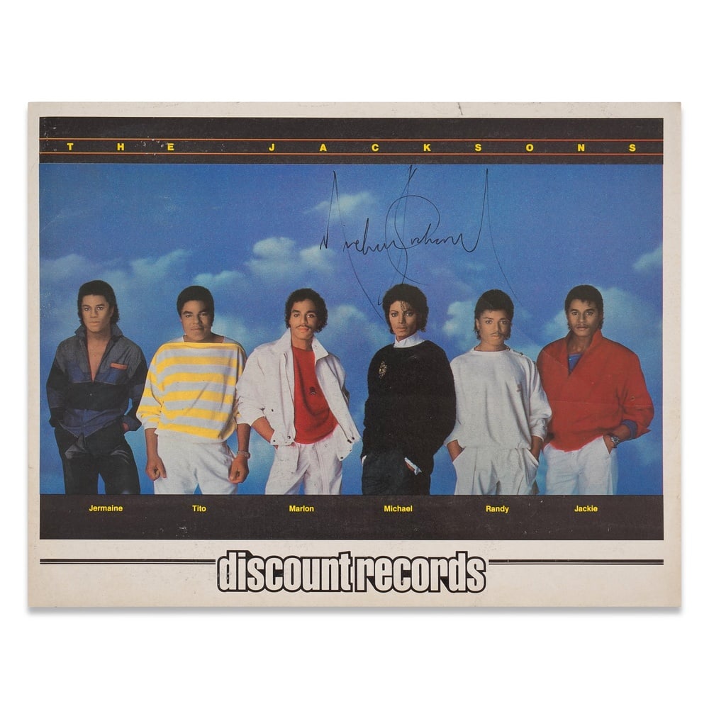 MICHAEL JACKSON SIGNED THE JACKSONS "DISCOUNT RECORDS" PROMOTIONAL POSTER: 11 x 8 1/2 in (28 x 21.5 cm) Provenance and Authentication: According to the Letter of Authenticity (LOA) and Certificate of Authenticity (COA) provided by the consignor, this collectible was
