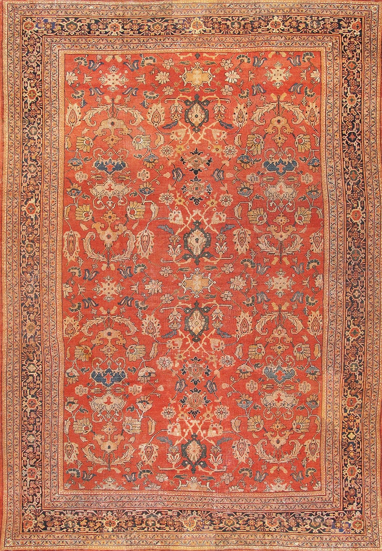 Impressive Antique Sultanabad Carpet, West Persia, 13' 4'' X 19' 4'': Of monumental scale, measuring approximately 13 ft. 4 in. x 19 ft. 4 in., this exceptional Sultanabad carpet is knotted in fine hand-spun lamb?s wool. The expansive rust field is adorned with an elega