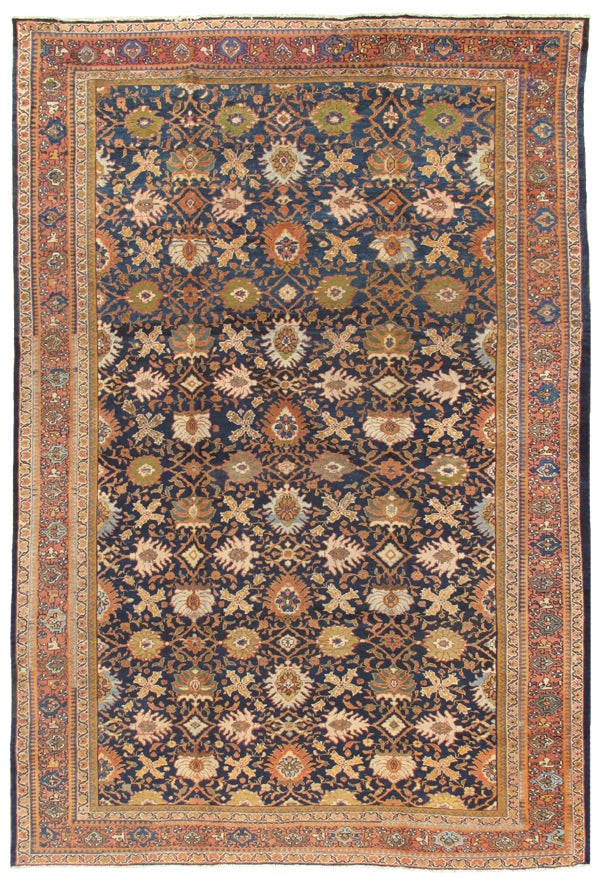 Antique Sultanabad Carpet, West Persia, 10' 0'' X 14' 7'': A Persian Sultanabad antique carpet, early 20th century, measuring approximately 10 ft. x 14 ft. 7 in., knotted in fine hand-spun lamb’s wool. The navy field is adorned with an elegant allover d