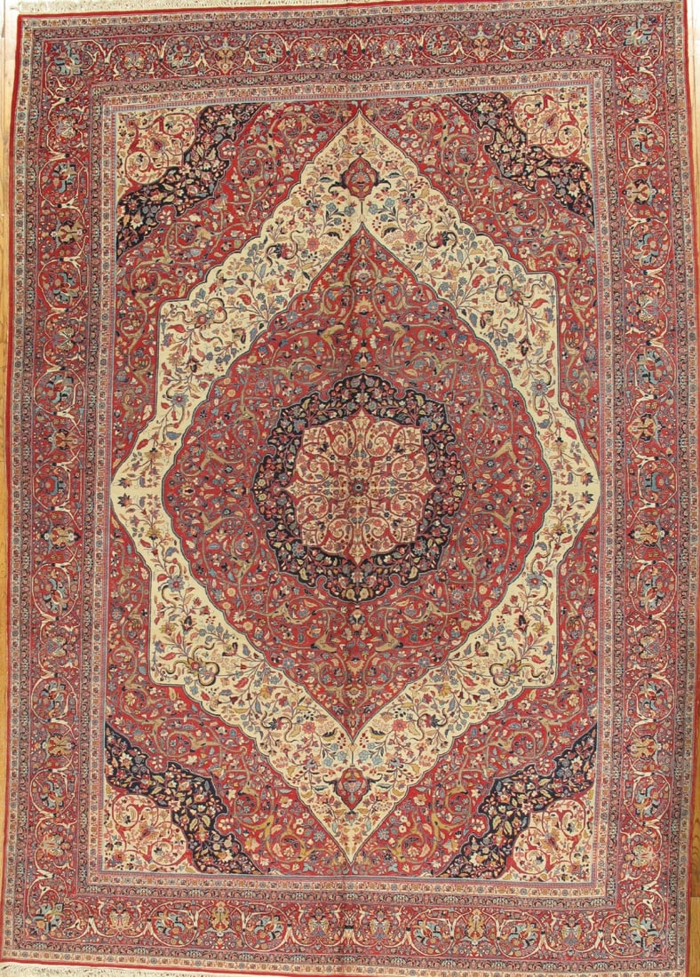 Antique Persian Tabriz Haj Jalili Carpet, Ivory and Red, 10' 7'' X 15' 0'': An exquisite antique Tabriz carpet in the revered Haj Jalili tradition, centered by a refined medallion floating across a luminous ivory field enriched with warm red accents. The fine lamb’s woo