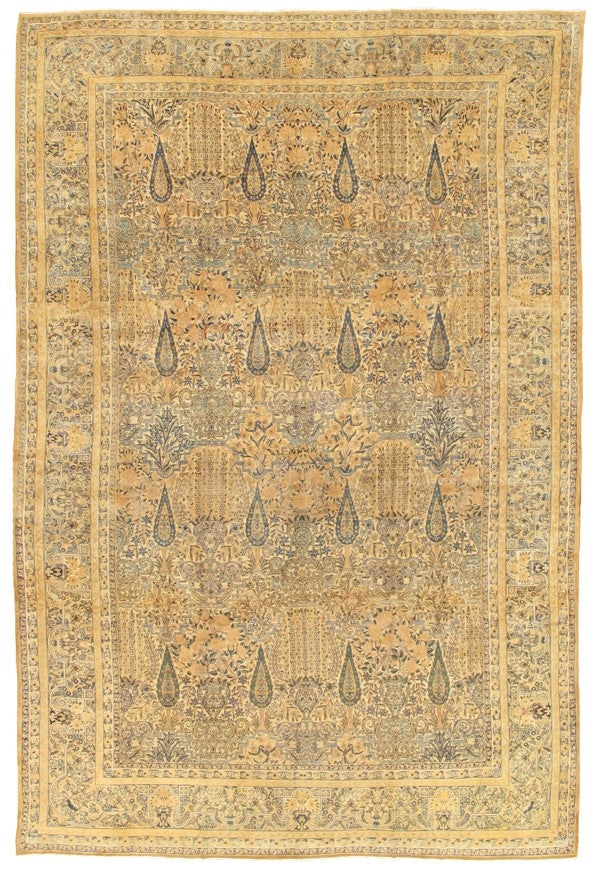Antique Lavar Kerman Carpet, Southeast Persia, 9' 9'' X 14' 8'': The luminous golden field elaborately knotted with an all-over pattern of elongated boteh motifs interspersed with intricate flowering vines and palmettes, rendered in delicate tones of beige. The dis