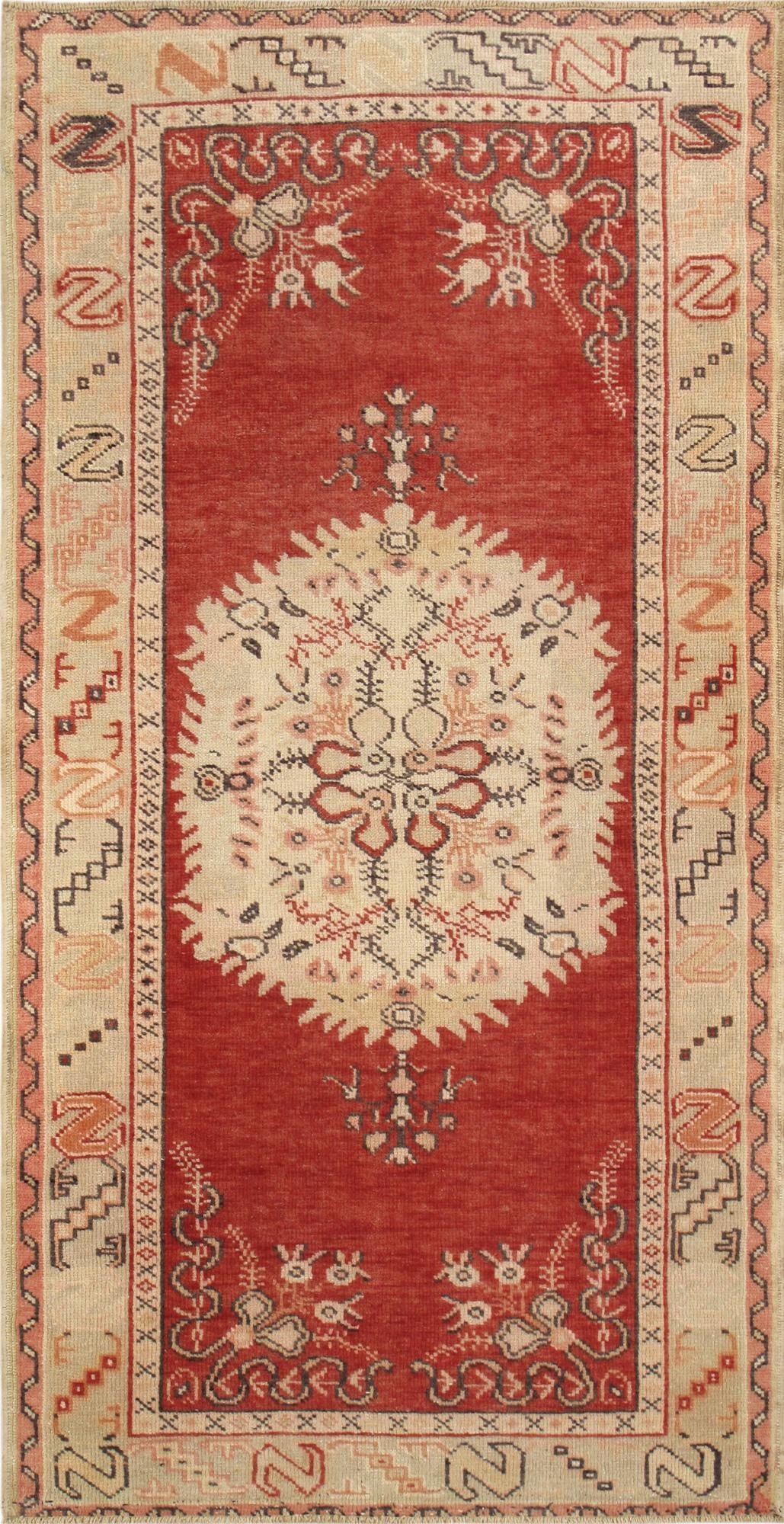Vintage Turkish Konya Medallion Rug, 3' 4'' X 6' 6'': Vintage Turkish Konya medallion rug, hand-crafted in fine lamb’s wool, featuring a harmonious coral and beige palette. Measuring 3'4" by 6'6", the rug displays a central medallion surrounded by 