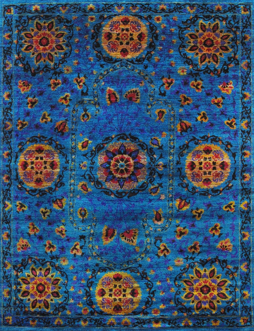 Suzani Hand-Knotted Sari Silk Area Rug- 5' 5" X 8' 1", Blue: Meet the Pasargad Home Suzani Collection, a stunning expression of artistry and craftsmanship. Inspired by traditional Suzani textiles, these hand-knotted rugs feature a beautiful symphony of floral m