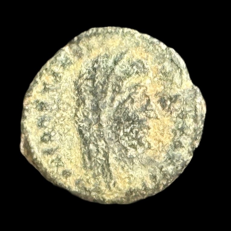 Constantine I AE4 Ancient Roman Coin: Constantine I Date of Strike: 337-347 AD Mint: Antioch Material and Type: AE4 Obverse: DV CONSTANTINVS PT AVGG - Bust of Constantine I right, veiled, draped, cuirassed Reverse: IVST VEN MEM - Aequitas
