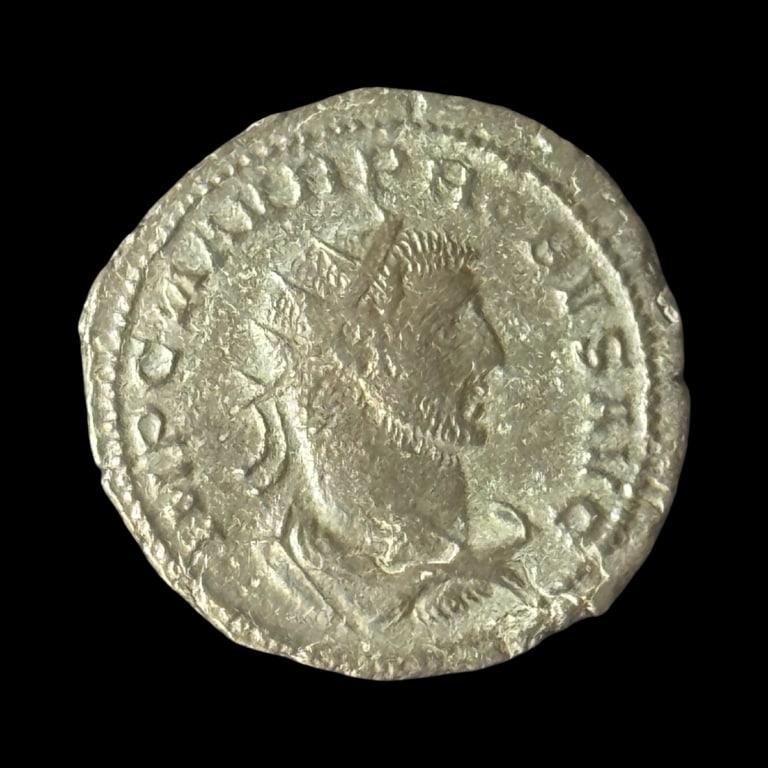Probus BI Double Denarius Ancient Roman Coin: Probus Date of Strike: 276-282 AD Mint: Antioch Material and Type: BI Double Denarius Obverse: IMP C M AVR PROBVS AVG - Bust of Probus right, radiate, draped, cuirassed Reverse: CLEMENTIA TEMP - Probu