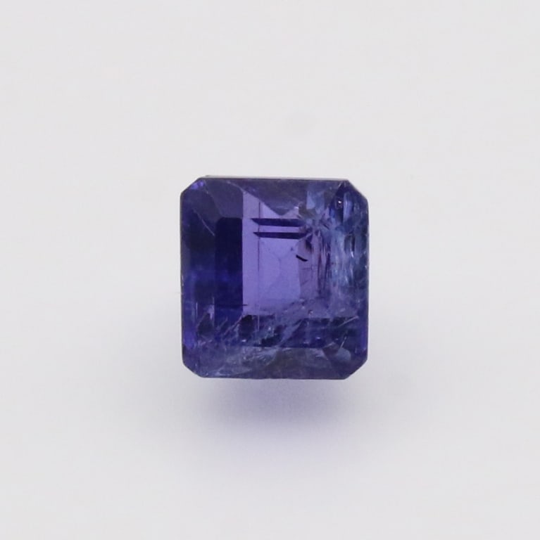 CERT Type I 4.55 Ct Tanzanite Ziosite Emerald: CERT TYPE I 4.55 ct TANZANITE ZIOSITE REPORT # - 185067 TYPE - TANZANITE MEASUREMENT (mm) - 8.24 x 7.67 x 7.06 COLOR - SHAPE - EMERALD ORIGIN - ZIOSITE TREATMENT -HEATED WEIGHT (ct) - 4.55 CLARITY - T