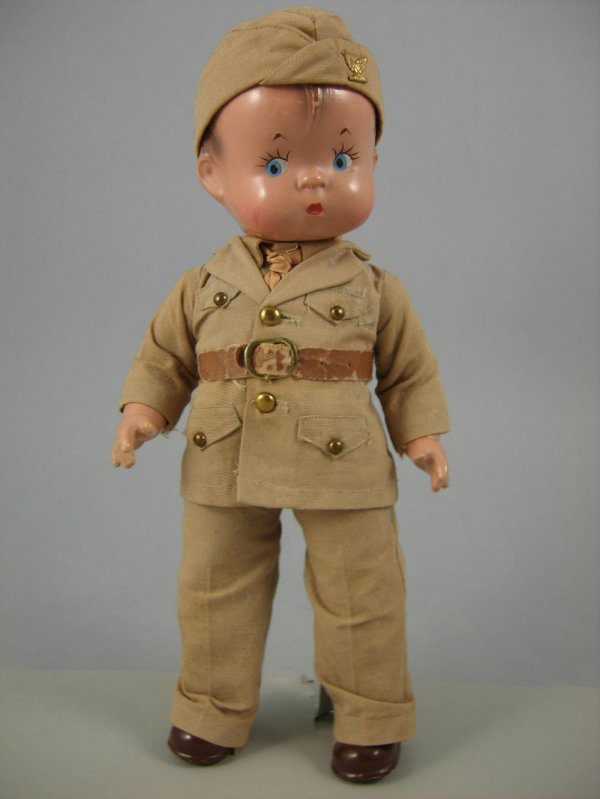 14" EFFANBEE SKIPPY SOLDIER: Marks: EFFANBEE//SKIPPY//copyright mark. Composition socket head; painted blue eyes; molded and painted hair. Cloth body with composition arms and legs. Original clothes.