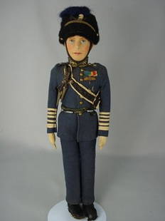 15" CLOTH PORTRAIT OF KING GEORGE VI: Marks: Farnell's//Alpha Toys//Made in England on soles of boots. Felt head with pressed and painted facial features, firmly stuffed body jointed at shoulders and hips. Wearing regimental costume with