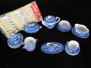 JAPAN BLUE WILLOW TOY DISHES AND ALUMINUM FLATWARE: Blue Willow pattern 24-pc. porcelain dinner set made in Japan. Includes tureen w/cover, sauce dish w/attached underplate, oval platter, creamer, sugar w/lid, teapot w/lid, 6 each plates, cups, saucers