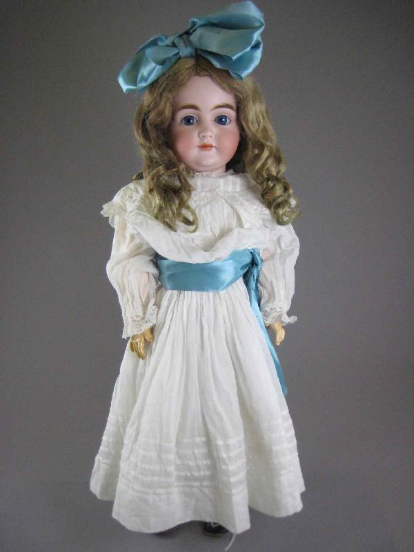 25" J.D. KESTNER 128 POUTY DOLL: Back of bisque socket head is marked as shown. No damage. This girl has the creamy bisque that Kestner is know for, cobalt blue sleep eyes, gray painted lashes, heavy feathered brows, and closed pouty