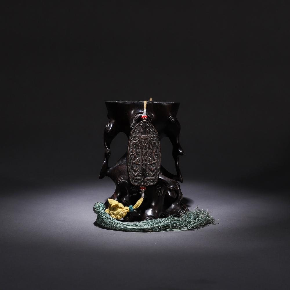 An agarwood shogun token was originally paired with an: 7.7cm*3.9cm/27.8g