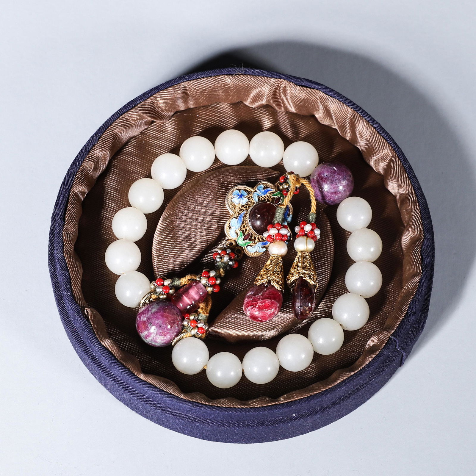 A string of 18 Hetian jade beads (1 of 7)