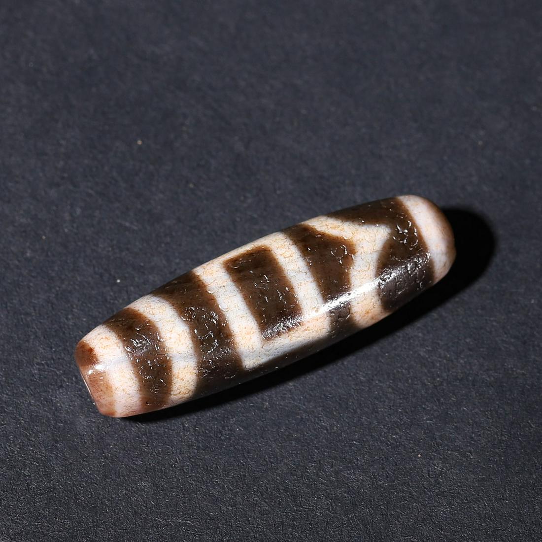 A cinnabar dzi bead (1 of 9)