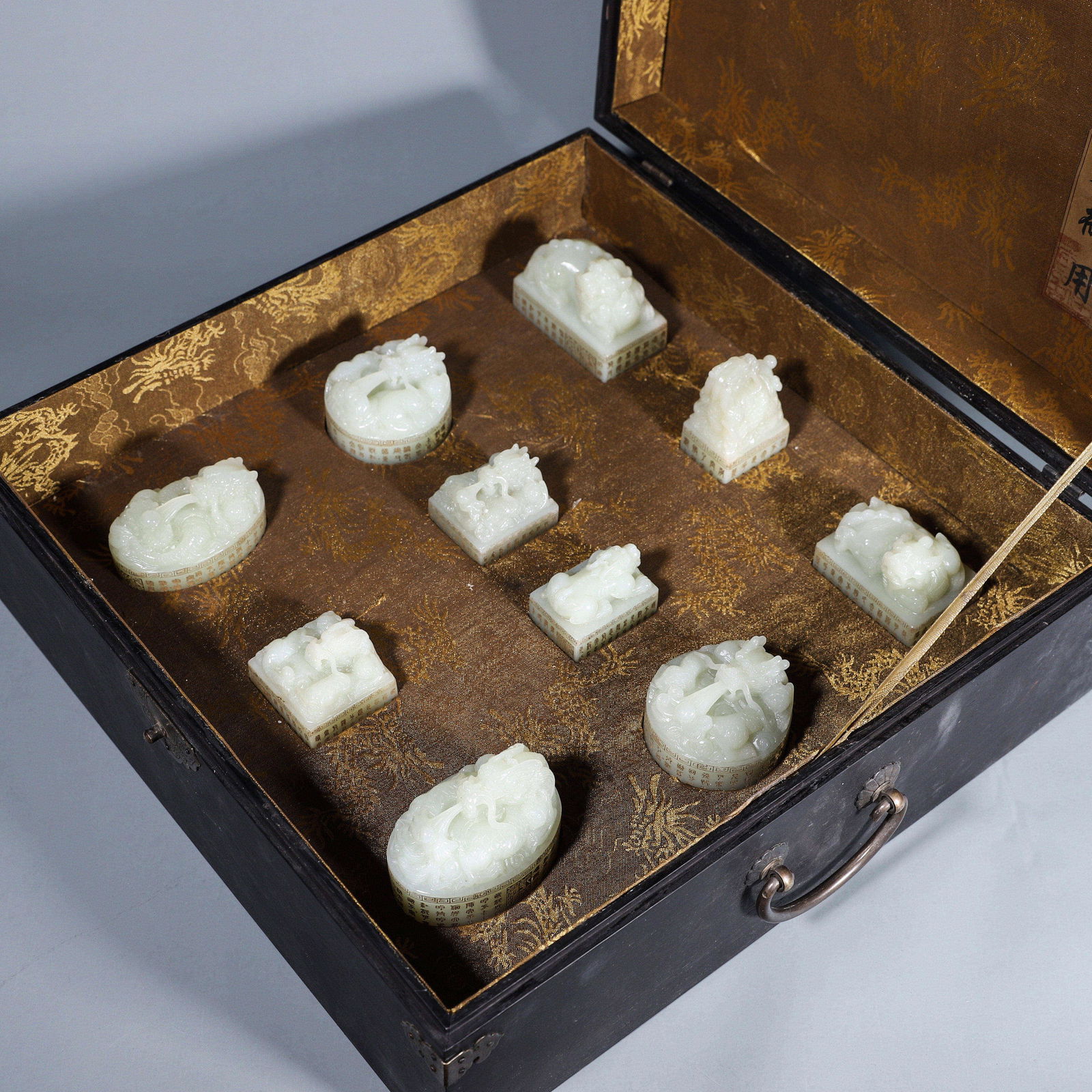 A set of beast and inscribed Hetian jade seals (1 of 12)