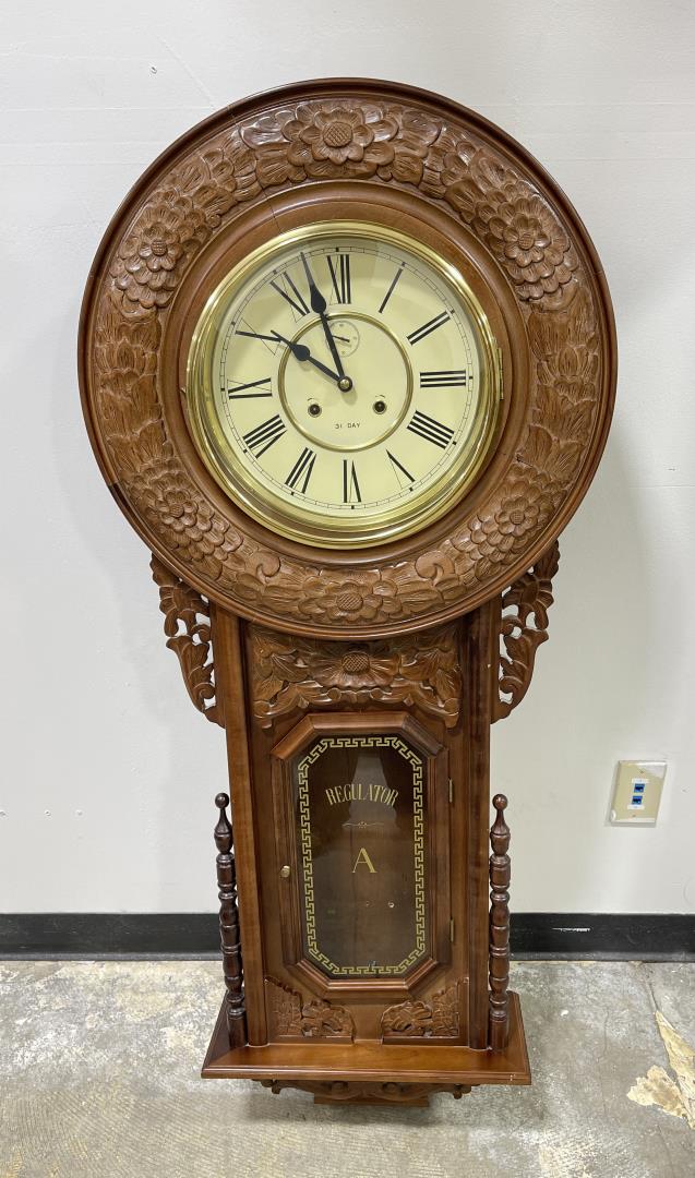 Carved Wood 31 Day Regulator Clock: Will be very expensive to ship. Has pendant as shown. Front latch broken. Large clock. 52" tall. Will be very expensive to ship.
