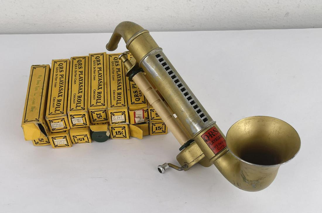 Antique Q.R.S. Roll Playsax Toy: Nice toy with a bunch of rolls.