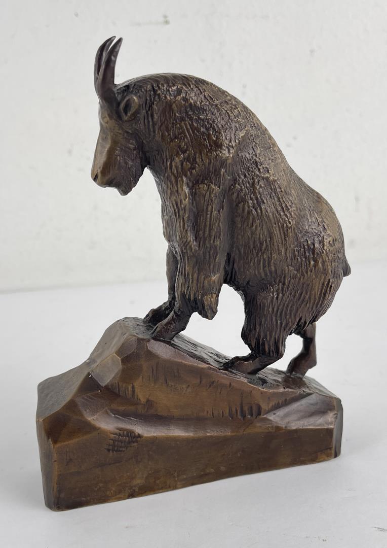 John Louis Clarke Bronze Mountain Goat Montana: Artist is John Louis Clarke of Glacier Park Montana. Work is entitled "Climbing Goat". 7.25" tall, 5.25" long. How could a Native American boy lacking the ability to hear or speak and raised at the ed