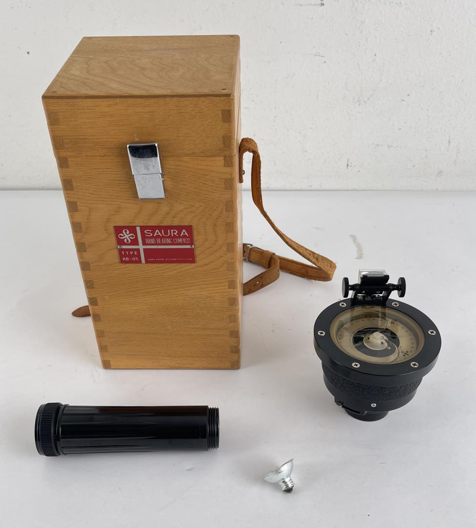 Saura Hand Bearing Boat Compass Type MB-65: Nice example in case. Does have some corrosion in battery well.