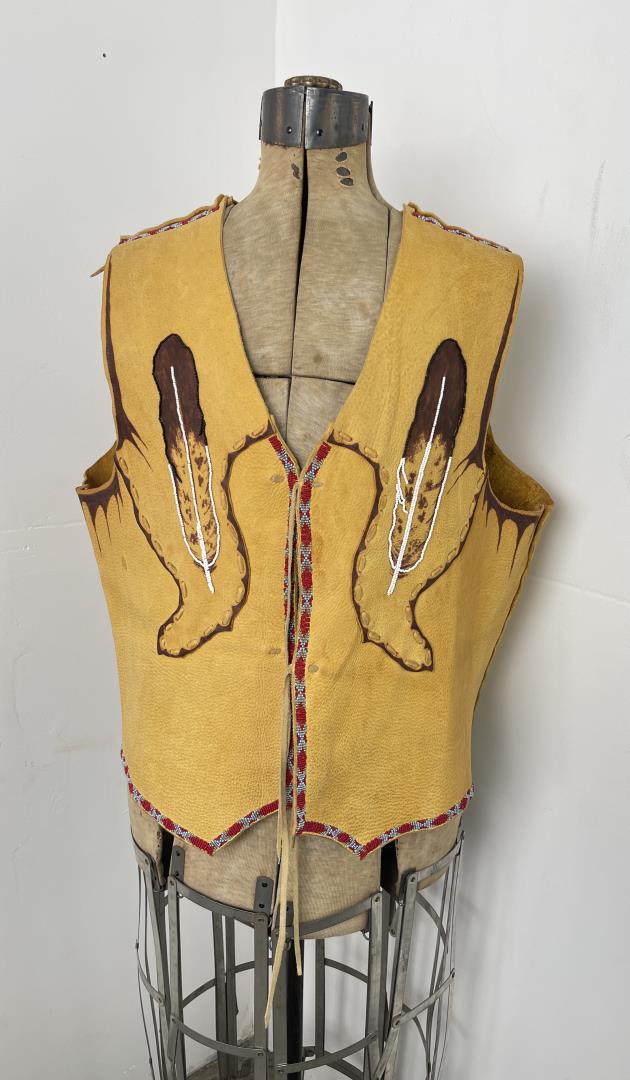 Plains Native American Indian Beaded Vest: Beaded and decorated. Nicely made. Second half of the 20th Century. 21" chest, 23" long.