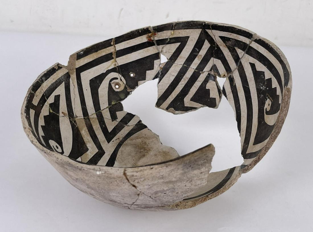 Ancient Mimbres Anasazi Pottery Indian Pot Bowl: Bowl has been put back together from shards. Pieces Missing. 8" diameter. 3 3/4" tall. Ex Roy Evans Collection. Allard Auction Collection Inv: EVAN