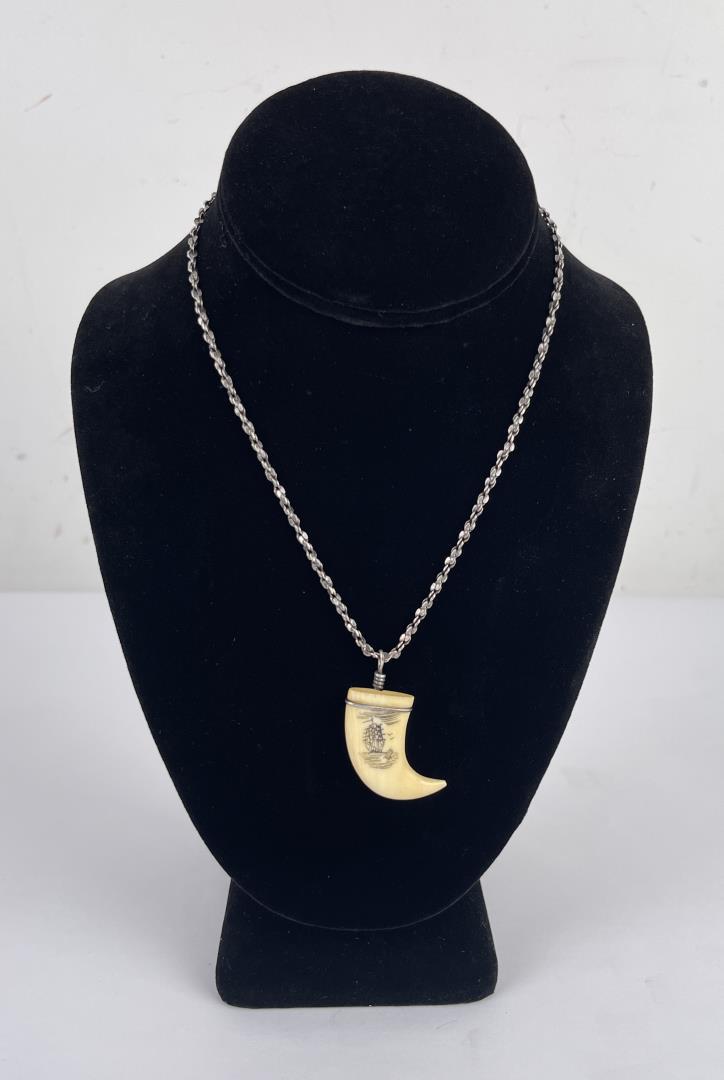 Alaskan Eskimo Inuit Scrimshaw Necklace: Very nice scrimshaw claw form necklace. Sterling chain. Allard Auction Collection Inv: SUZ