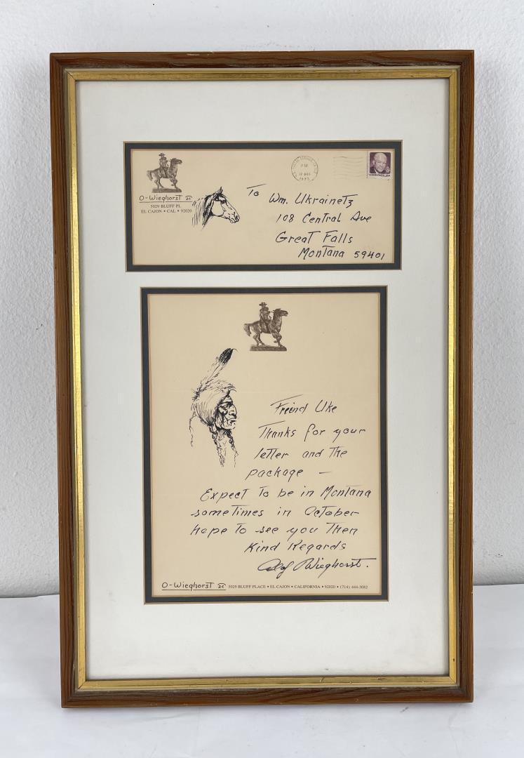 Olaf Carl Wieghorst Letter and Envelope w/ Drawing: Pen and Ink. Letter written on Wieghorst's letterhead with drawing, also included is the original envelope with horsehead drawing. 14 1/4" by 22 1/4" framed. Provenance: Ex CM Russell Art Museum on lo