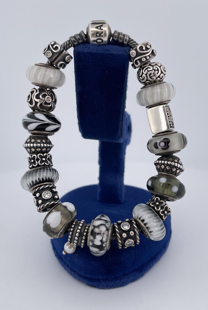 Pandora Sterling Silver Charm Bracelet: 21 Charms in total.