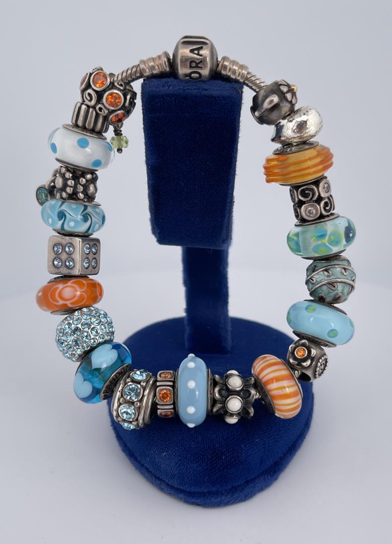 Pandora Sterling Silver Charm Bracelet: 22 total charms.