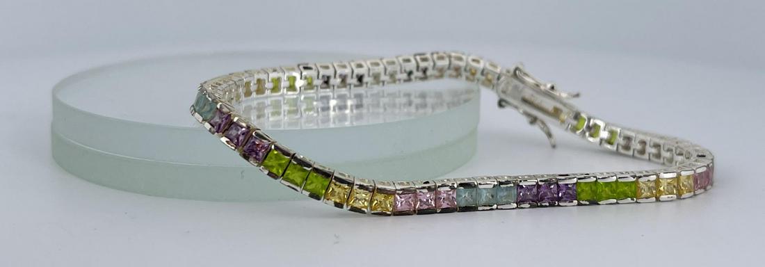 Sterling Silver Semi Precious Tennis Bracelet: Very nice bracelet. Semi Precious stones set in sterling silver. 7 1/4" long.