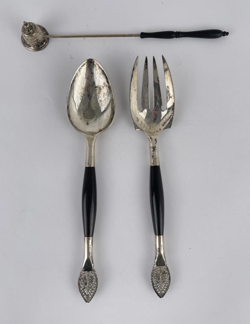 Collection of Sterling Silver Dining Utensils: The serving set is Thai or Cambodian, it has sterling silver mounted with ebony handles. The candle snuffer is sterling silver with a hard rubber handle.