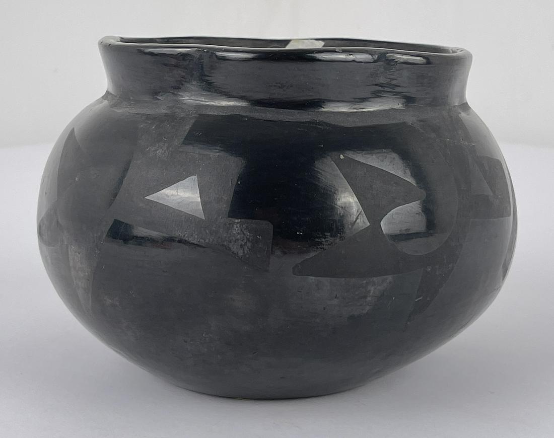 San Ildefonso Pueblo Pottery Indian Pot Isabel: Signed Isabel. 4 1/2" tall, 6 1/4" diameter. Allard Auction Collection Inv: DOK 26020
