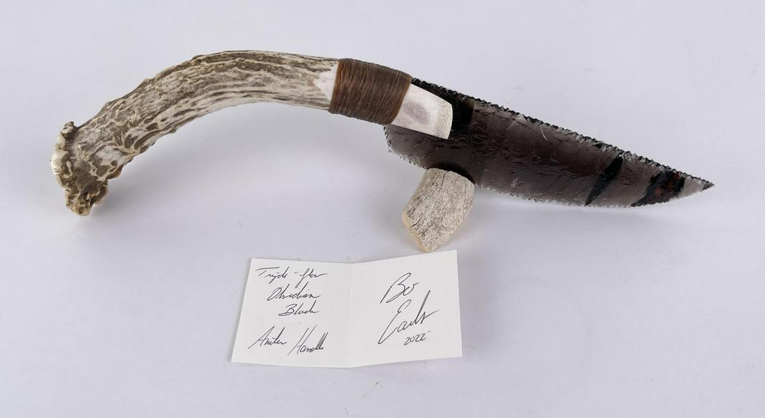 Bo Earls Handmade Obsidian Horn Handle Knife: Handmade by Bo Earls. Bo is one of the finest modern flint and obsidian knappers. His knives are some of the nicest money can buy. The handle is whitetail deer horn. 11" long including handle.